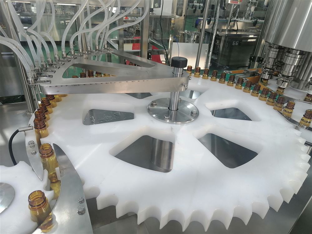 50ml塑料瓶口服液灌裝旋蓋機(jī)視頻播