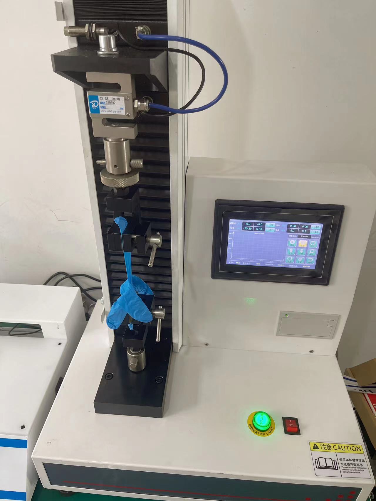 橡膠手套老化前后扯斷伸長率測試儀